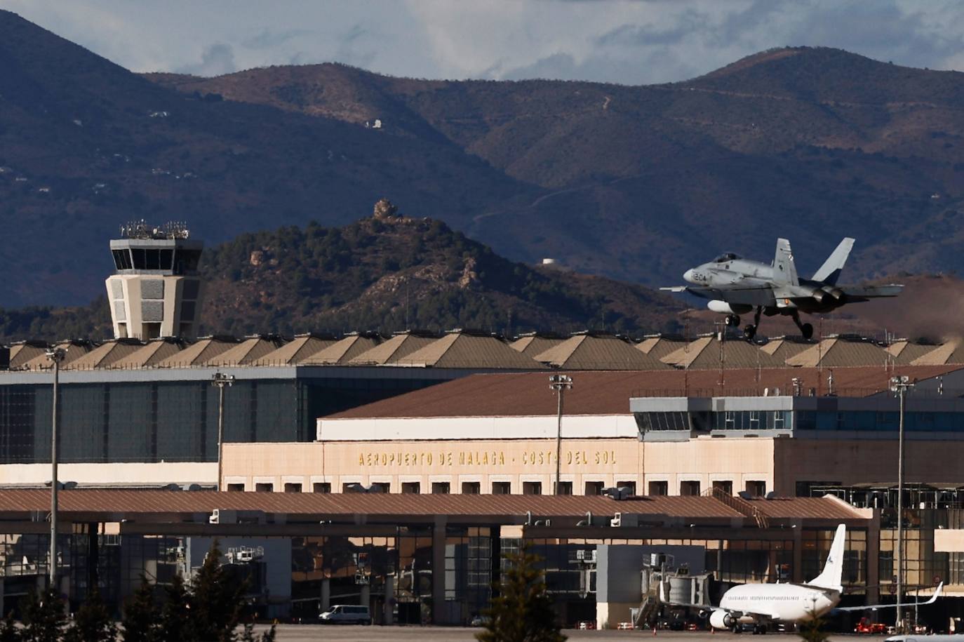 F-18 fighters fly over the surroundings of the airport and the Bay of Malaga 
