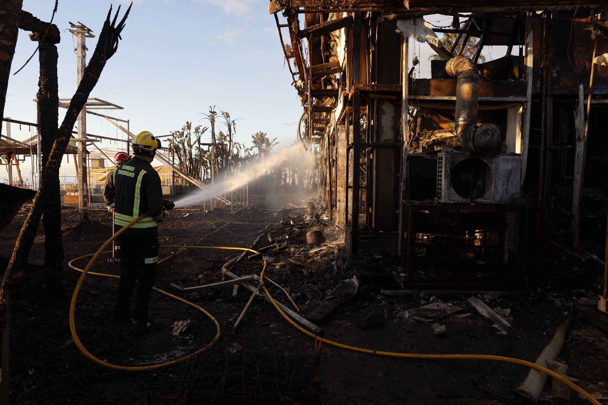 Firefighters amongst the tangled wreckage this Thursday morning.