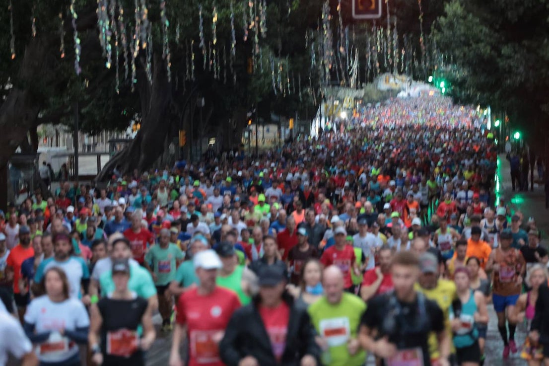 Runners in the Generali Malaga Marathon race on Sunday, 11 December 2022
