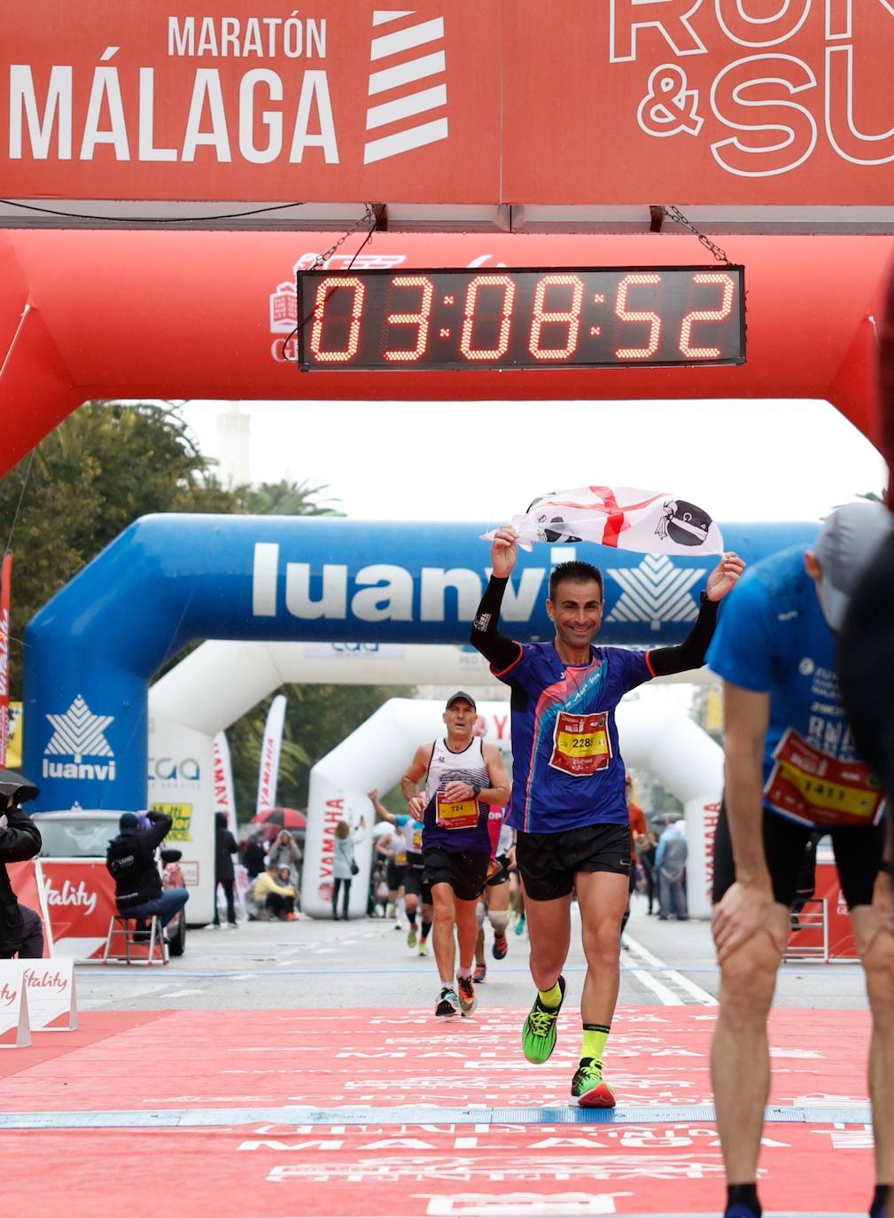Runners in the Generali Malaga Marathon race on Sunday, 11 December 2022