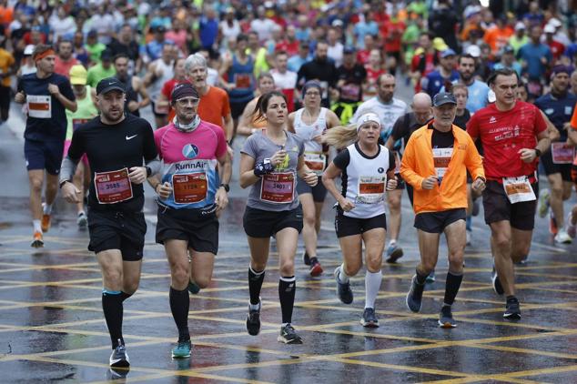 Runners in the Generali Malaga Marathon race on Sunday, 11 December 2022