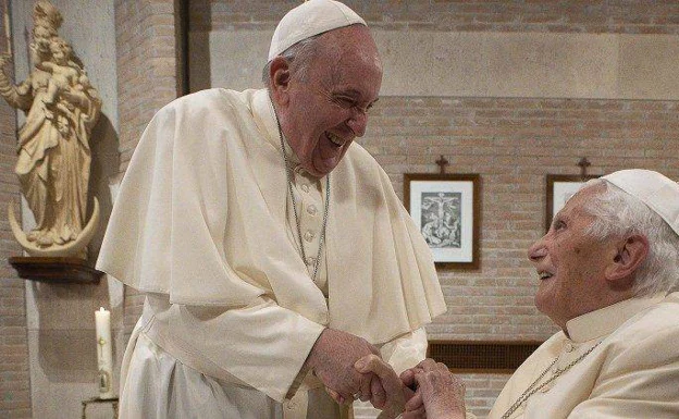File photo of Pope Francis with Benedict XVI. 