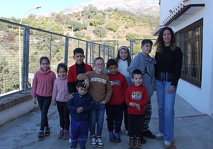 Pupils and teacher who make up the only class in Salares.