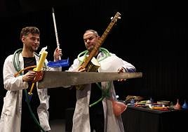 Joaquín Sánchez Gil andMiguel Guinea on stage with some of their instruments.