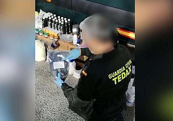 A Guardia Civil Tedax bomb disposal expert at the clandestine lab.