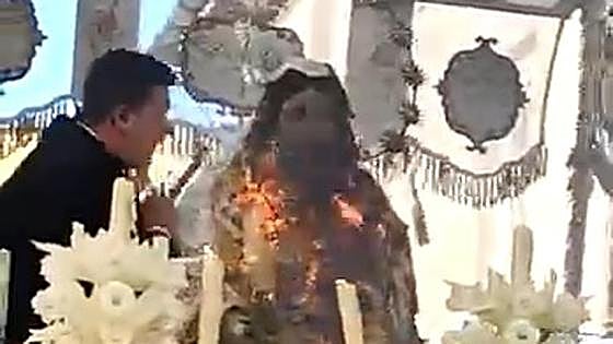 This is the shocking moment a candle set alight a Palm Sunday procession in Malaga province