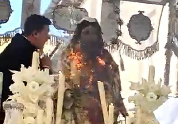 This is the shocking moment a candle set alight a Palm Sunday procession in Malaga province