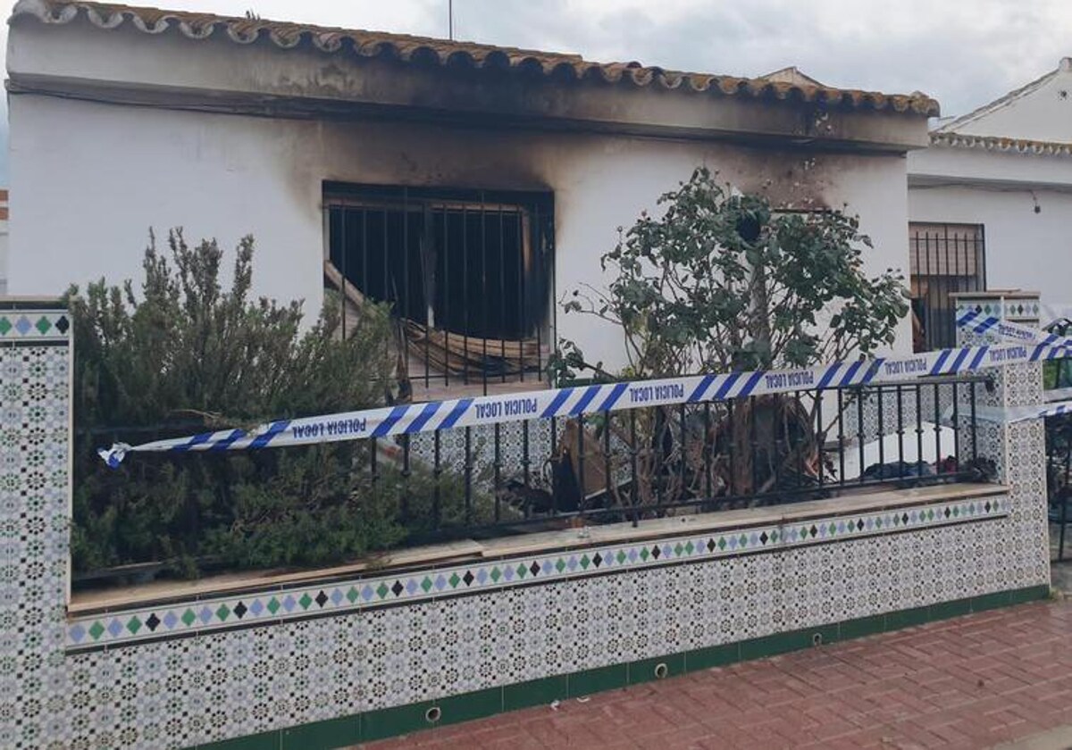 The charred house where the children were found by police.