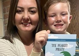 Jay and James with the book they hope will raise allergy awareness.