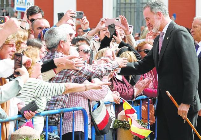 King Felipe VI greets the royalty fans who lined the streets near Ronda’s bullring on Wednesday