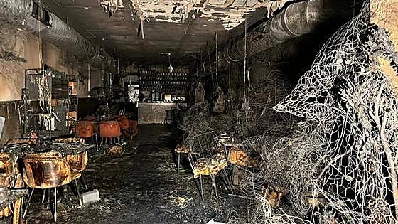 Investigations continue after flambéed pizza sparks fire in Madrid restaurant that left two people dead