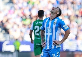 Malaga striker Rubén Castro after his spot-kick was saved.