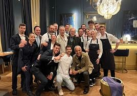 Staff from Amar restaurant with Obama, Spielberg and Springsteen.