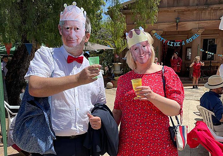 Jukke and Ulla from Finland wore Charles and Camilla masks