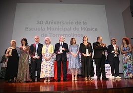 Teachers and staff of the music school mark the anniversary.