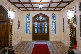 The new stained glass windows depicting all 16 Overseas Territories coats of arms.