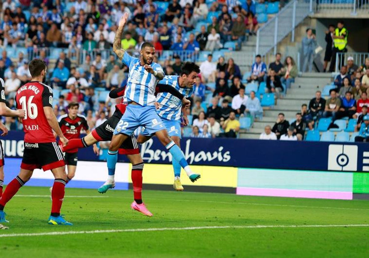 Alberto Escassi's powerful header gave Malaga an early lead.