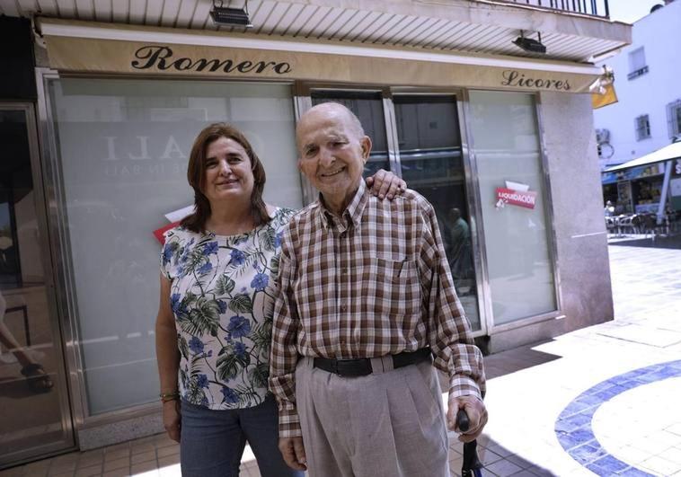 Rafael and Concepción Romero, father and daughter, at the door of the store.