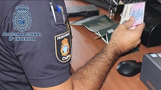 Spanish police arrest 64 people for buying fake driving licences, passports and ID cards
