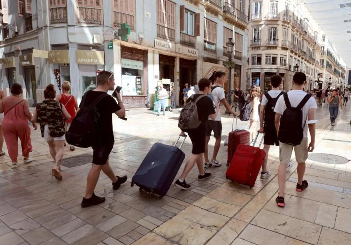 Tourists in Malaga city.