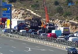 The remains of the burnt-out lorry.