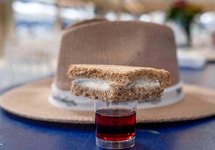 Gorgonzola sandwiches and brandy are described in the novel