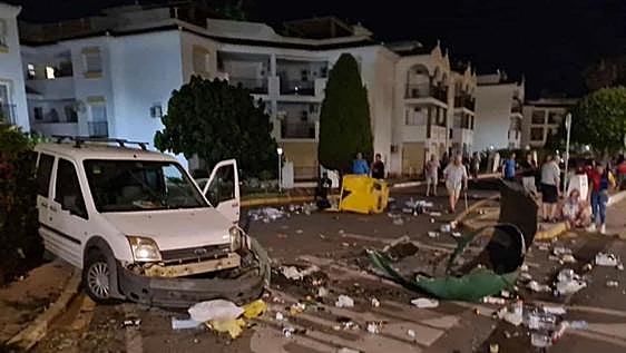 Driver more than double the alcohol limit crashes van into containers in Mijas