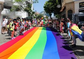 The giant rainbow flag is unrolled during Gibraltar's Pride celebrations on Saturday.