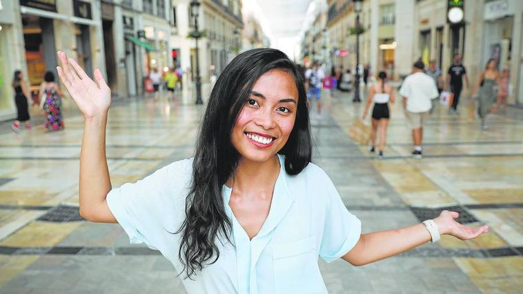 Nesh poses in Calle Larios in Malaga city centre.