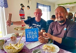 Manuel Calvo shows some Malaga province products to locals on the island of Unartoq.