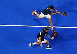 Ruiz, bottom, and Tello scramble to retrieve a ball.