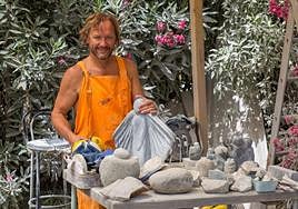 Scottish-born sculptor Toby Govan with some of his creations designed to be touched.