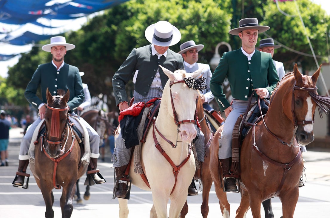 Tuesday's best images of Malaga's spectacular summer fair