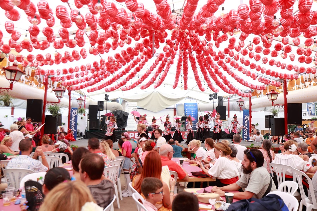 Tuesday's best images of Malaga's spectacular summer fair