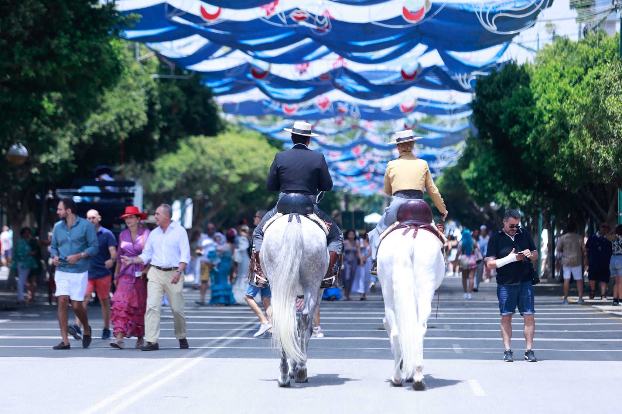 Tuesday's best images of Malaga's spectacular summer fair
