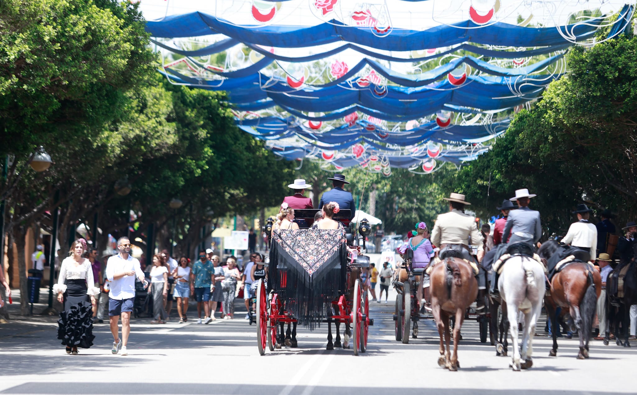 Tuesday&#039;s best images of Malaga&#039;s spectacular summer fair
