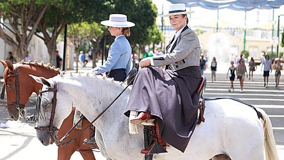 Tuesday's best images of Malaga's spectacular summer fair