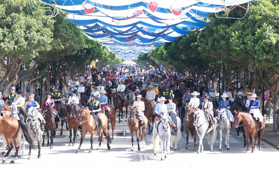 Tuesday's best images of Malaga's spectacular summer fair