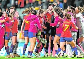 The Spain players join together at full time after securing victory over Sweden. Full-back Carmona after having scored the winning goal.