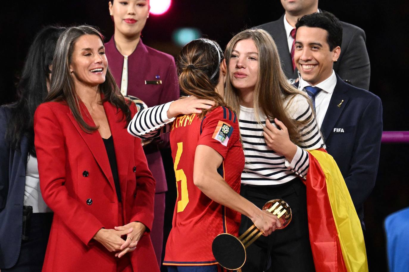 The Infanta Sofía congratulates Aitana Bonmatí at the end of the match, in the presence of Spain's Queen Letizia.