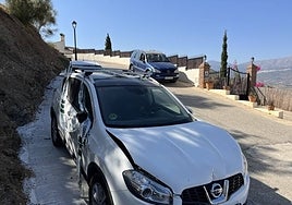 Photo of the alleged assailant's car on the road in the village of La Viñuela.