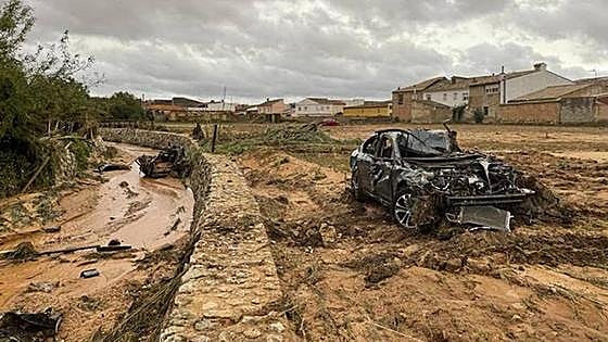 In pictures and video: storm smashes into central Spain leaving several people dead and missing