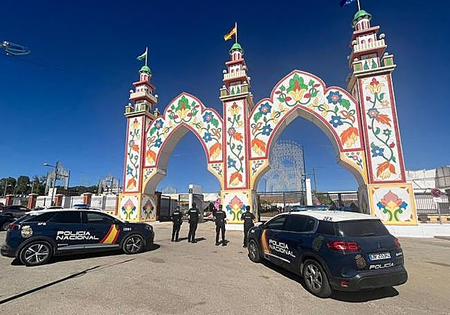 Police officers at the main entrance of the fair.