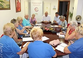 The town hall held the meeting with members of local charitable organisations.