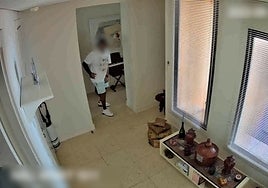 One of the robberies in progress.