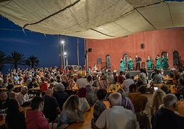 Visitors and locals enjoy entertainment at Bil Bil castle.