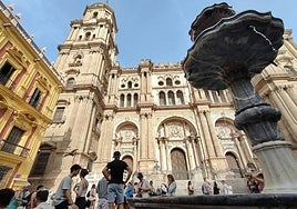Tourists in the Plaza del Obispo, next to Malaga Cathedral