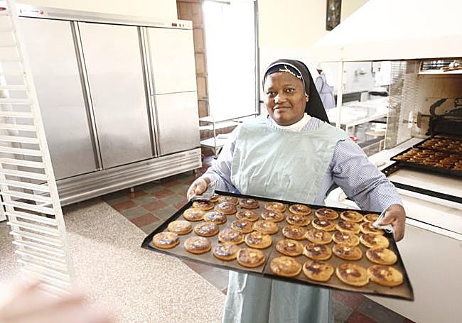 After baking, the handmade products are cooled and wrapped.