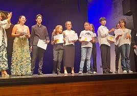 Winners of this year's young musicians competition with Arts Society Nerja Chair, Helen Sijsling (left).