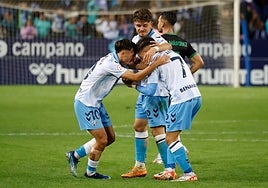 Larrubia congratulates Haitam for his equalising goal.